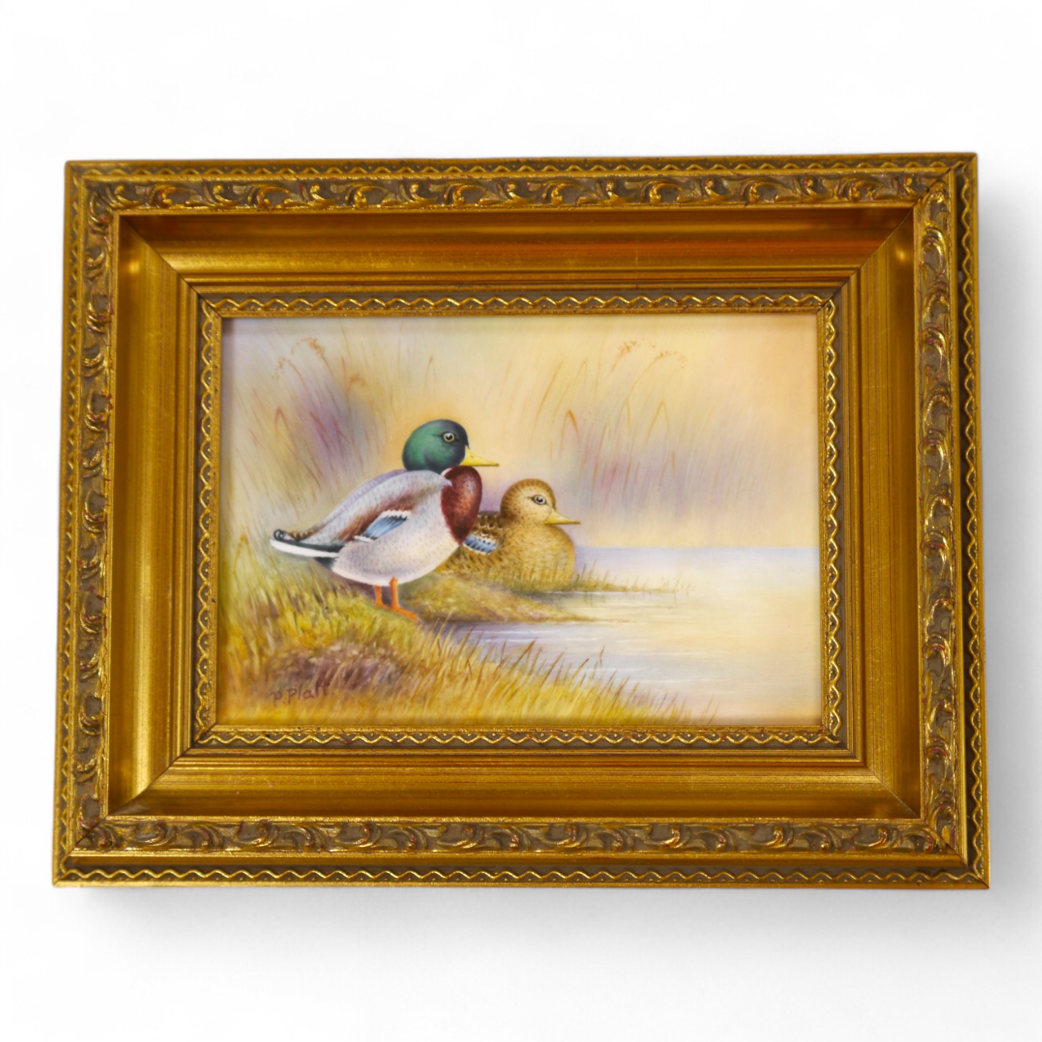 A Royal Worcester framed porcelain plaque, decorated with ducks, signed P. Platt (Peter Platt), 12 x 17cm. Condition - good